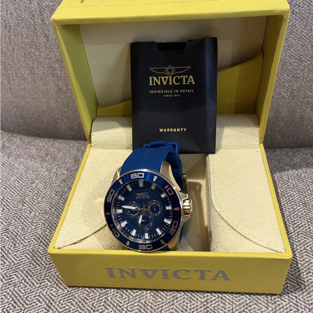 Invicta Blue Dial and Silver Case Watch